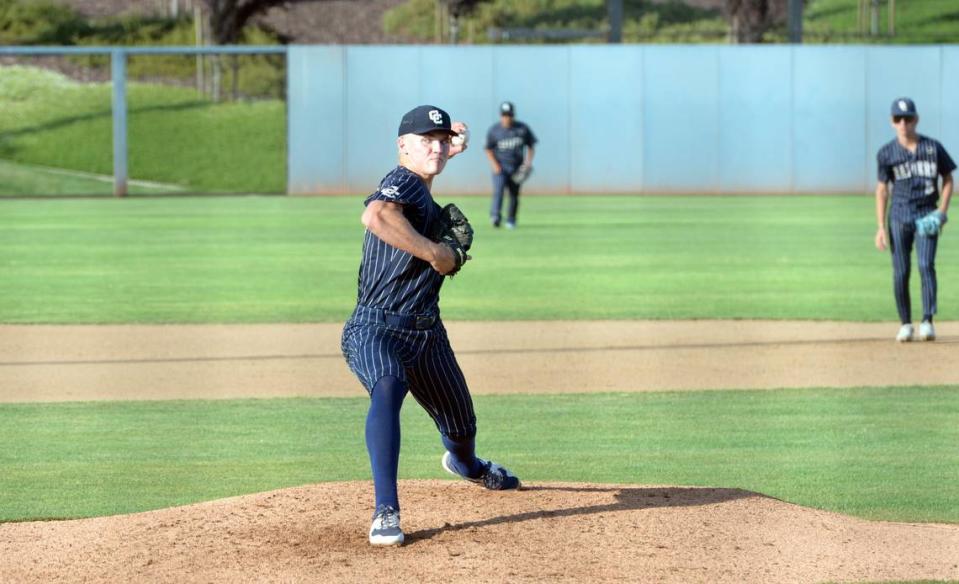 Central Catholic starting pitcher TP Wentworth delivers a pitch in the first inning of the Sac-Joaquin Section Division III Championship game at Islander’s Park in Lathrop on Thursday, May 25, 2023. Central Catholic won the game 3-2 in extra innings.