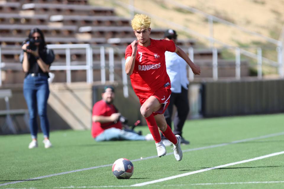 Perryton’s Yahir Castillo (7) runs for the ball in a 4A Bi-District game against Burkburnett, Friday, March 24, 2023, at Happy State Bank Stadium in Canyon Texas.  Burkburnett won 3-1.