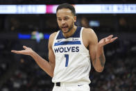 Minnesota Timberwolves forward Kyle Anderson (1) looks toward a referee after receiving a technical foul during the first half of an NBA basketball game against the Toronto Raptors, Wednesday, April 3, 2024, in Minneapolis. (AP Photo/Abbie Parr)
