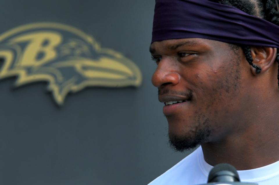Columnist Mike Preston writes that anything beyond three years is too risky for a quarterback who runs as much as Lamar Jackson. The Ravens' signal-caller could still receive significant guaranteed money and come back for another extension after three years.  (Karl Merton Ferron/Baltimore Sun/Tribune News Service via Getty Images)