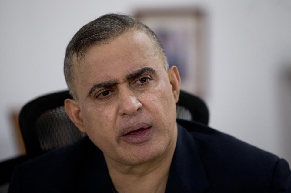 Venezuela's Chief Prosecutor Tarek William Saab speaks during a interview with the Associated Press at his office in Caracas, Venezuela, Thursday, Oct. 18, 2018. Saab said he is investigating the police officers who failed to keep safe an opposition politician who plunged from the 10th-floor of a high-security building even as he rejects calls for an independent probe into what authorities contend was a suicide. (AP Photo/Ariana Cubillos)