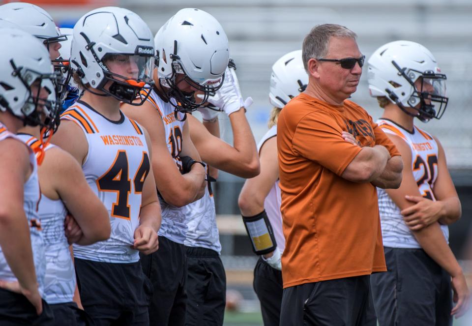 New Washington Panthers head football coach Todd Stevens watches his team take on Pekin during the annual 7-on-7 football camp Saturday, July 20, 2024 hosted by Washington Community High School.