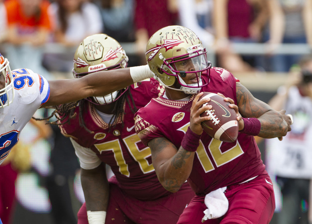 Florida defensive lineman Jabari Zuniga (92) gets a hand on Florida State quarterback Deondre Francois (12) in the 1st half of an NCAA college football game in Tallahassee, Fla., Saturday, Nov. 24, 2018. (AP Photo/Mark Wallheiser)