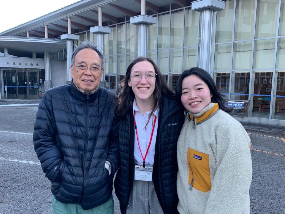 Chloe McLeod, center, with her host family, Natsuo Muramatsu and Miwa Fukuyama from Kawane-honcho, Shizuoka Prefecture, in front of Kawane-honcho Town Hall.