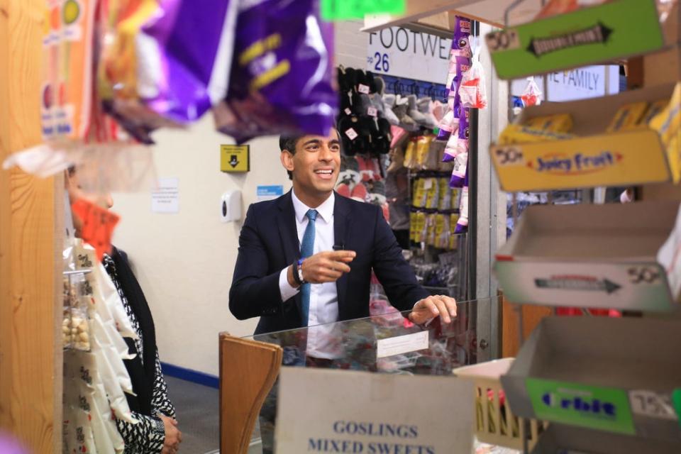 Chancellor Rishi Sunak at a sweet shop during a visit to Bury market in Lancashire (Lindsey Parnaby/PA) (PA Wire)