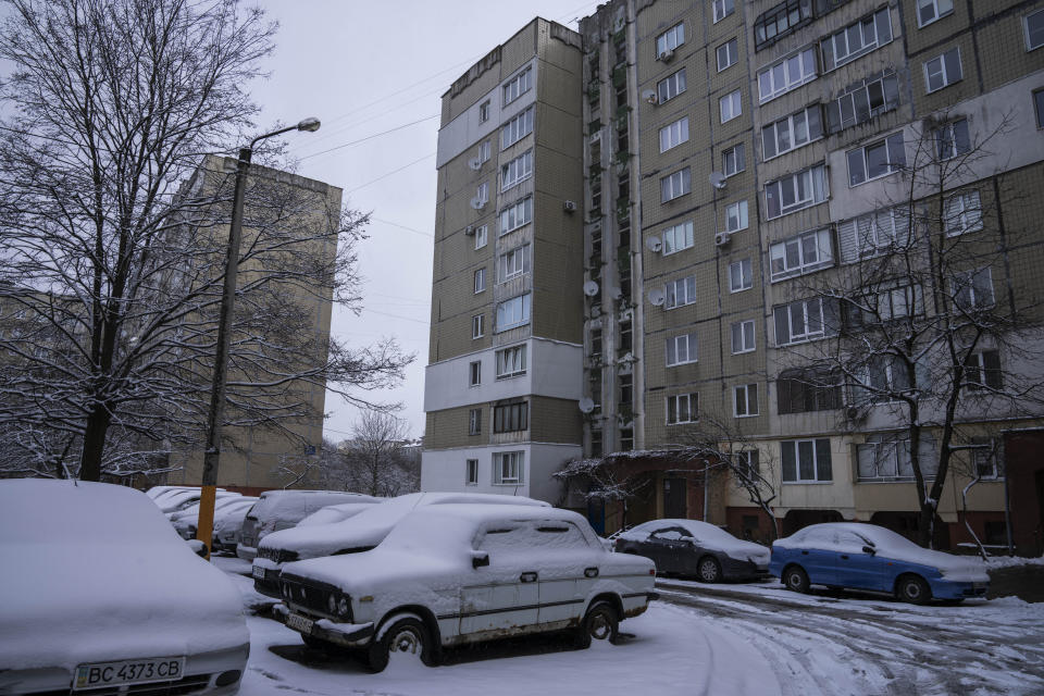 An apartment building that holds families from some of Ukraine's most devastated communities: bombarded Karkhiv near the Russian border, obliterated Irpin, and Kyiv, the capital itself, in Lviv, western Ukraine, Sunday, April 3, 2022. Lviv on the surface looks calm, but the city is uniquely representative of the 6 million people displaced inside Ukraine since Russia's invasion. (AP Photo/Nariman El-Mofty)