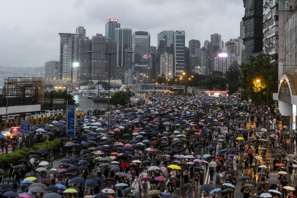 People take part in a demonstration on August 18, 2019 in Hong Kong, China. Pro-democracy protesters have continued rallies on the streets of Hong Kong against a controversial extradition bill since 9 June as the city plunged into crisis after waves of demonstrations and several violent clashes. Hong Kong's Chief Executive Carrie Lam apologized for introducing the bill and declared it &quot;dead&quot;, however protesters have continued to draw large crowds with demands for Lam's resignation and complete withdrawal of the bill. (Photo by Delphia Ip/NurPhoto via Getty Images)