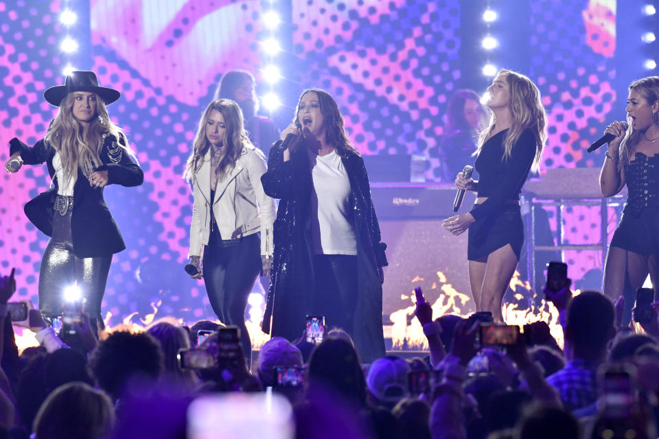 Lainey Wilson, from left, Morgan Wade, Alanis Morissette, Ingrid Andress and Madeline Edwards perform at the CMT Music Awards on Sunday, April 2, 2023, at the Moody Center in Austin, Texas. (Photo by Evan Agostini/Invision/AP)