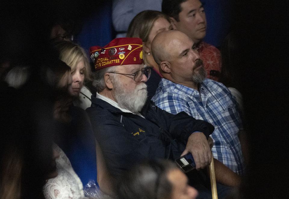 Terry Schow, retired executive director at Utah Department of Veterans Affairs, listens as President Joe Biden speaks on the one-year anniversary of passage of the PACT Act, the most significant expansion of benefits and services for toxic exposed veterans and survivors in over 30 years, at the George E. Wahlen Department of Veterans Affairs Medical Center in Salt Lake City on Thursday, Aug. 10, 2023. | Laura Seitz, Deseret News