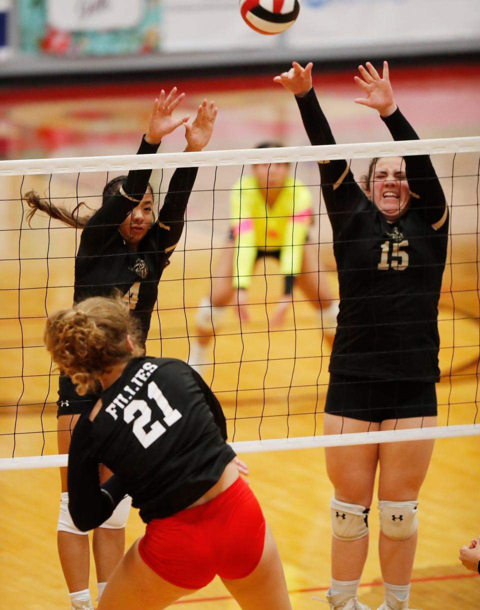 Lubbock High’s Rianna Canono (4) and Lilly Diaz (15) try to block a shot by Shallowater’s Mia Goicoechea (21) in their second match.  Shallowater played Lubbock High in volleyball Monday, August 8th, 2022.