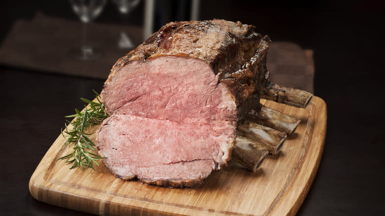 sliced prime rib on cutting board