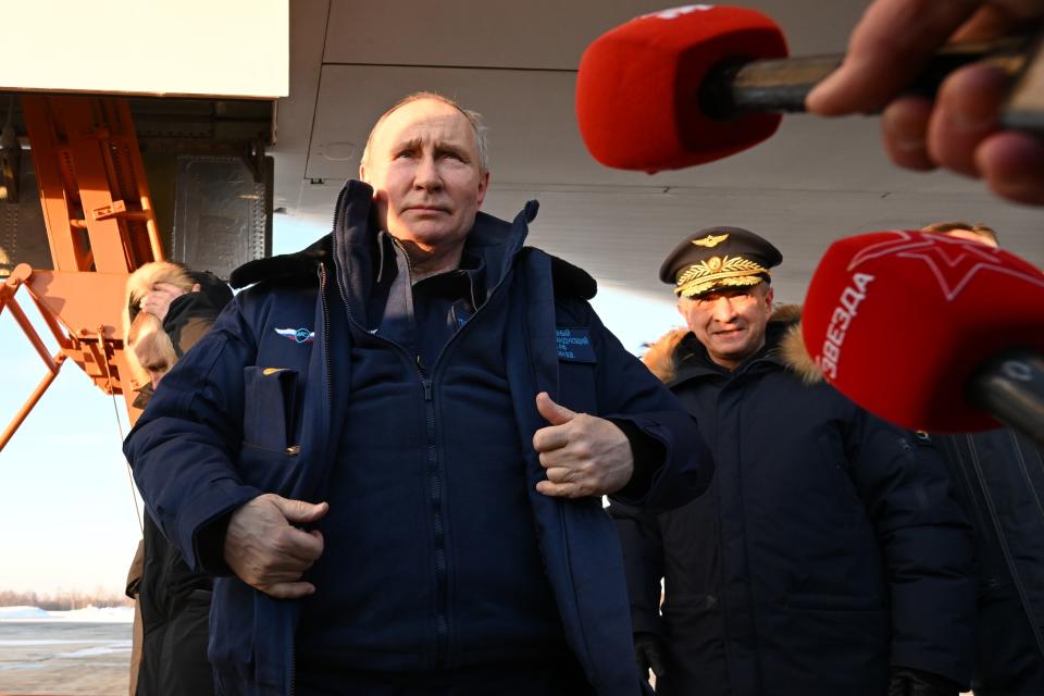 Russian President Vladimir Putin gets off a Tu-160M strategic bomber after a flight in Kazan, Russia, Thursday, Feb. 22, 2024. (Dmitry Azarov, Sputnik, Kremlin Pool Photo via AP)