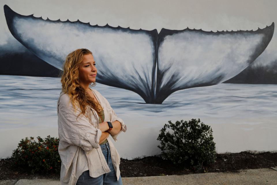 Roxanne Blackmore speaks about the whale tale mural she painted outside of the Dartmouth Mall.