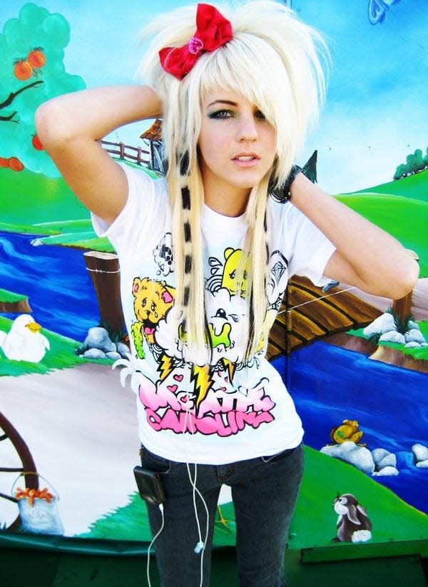 At age 19, Heidi Mae Herrington gained over 11,000 followers on MySpace under the username, "Heidi Mighty Bear." At the time, Herrington was popularly known as a "scene queen," a young woman affiliated with the "scene" movement that was popular in the early to mid-2000s.