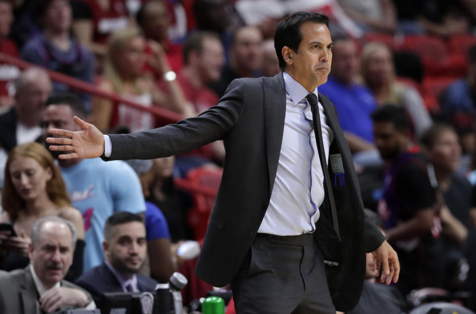 Miami Heat's Erik Spoelstra watches during the first half of an NBA basketball game against the Atlanta Hawks, Tuesday, Dec. 10, 2019, in Miami. The Heat won 135-121 in overtime. (AP Photo/Lynne Sladky)