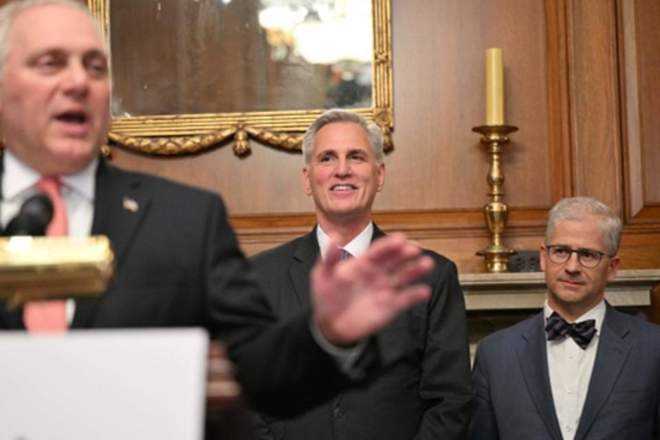 Republican debt limit negotiator Representative Patrick McHenry (R-SC) (R) and US House Speaker Kevin McCarthy (R-CA) listen to US House Majority Leader Steve Scalise (AFP via Getty Images)