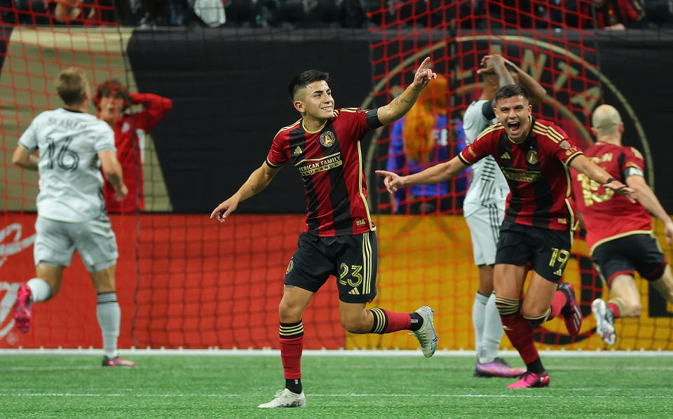 ATLANTA, GEORGIA - FEBRUARY 25:  Thiago Almada #23 of Atlanta United reacts after scoring the go-ahead goal on a free kick in stoppage time against the San Jose Earthquakes at Mercedes-Benz Stadium on February 25, 2023 in Atlanta, Georgia. (Photo by Kevin C. Cox/Getty Images)