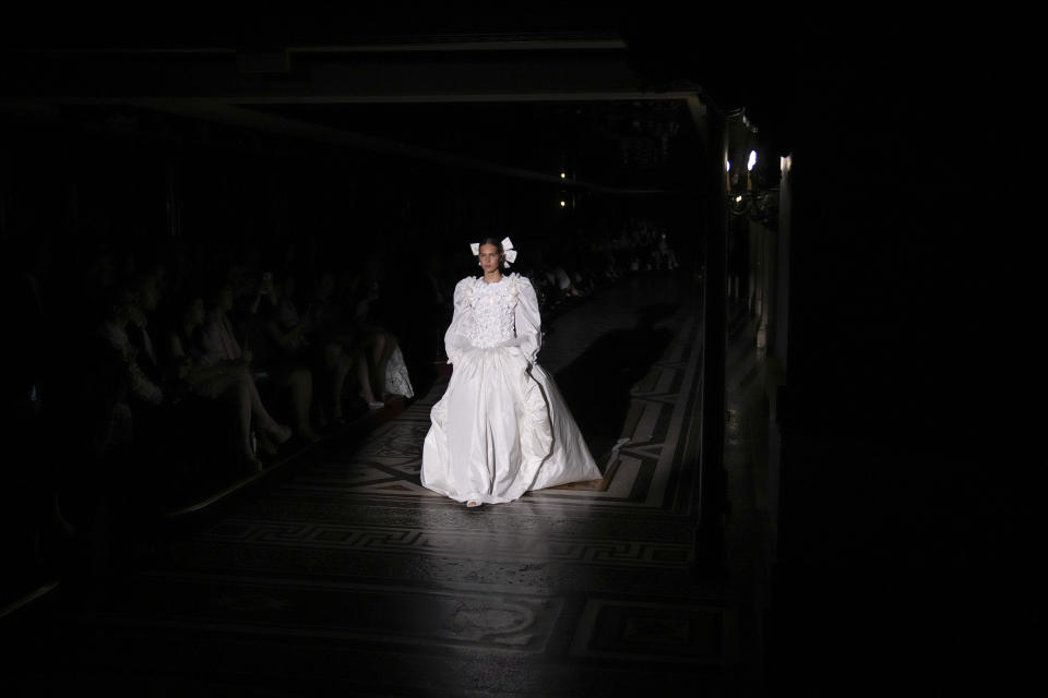 A model wears a creation for the Chanel Haute Couture Fall-Winter 2024-2025 collection presented Tuesday, June 25, 2024 in Paris. (AP Photo/Christophe Ena)