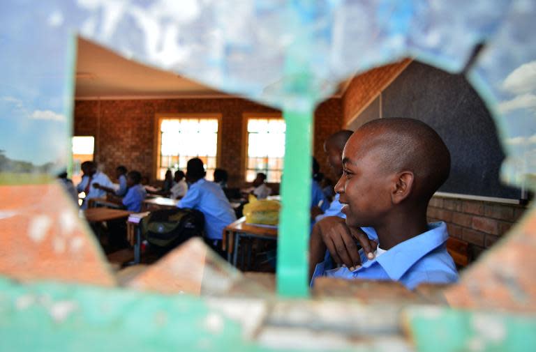 File photo of students in Limpopo, a rural area of South Africa where 5,000 children had no text books for more than six months because the government stuffed-up a delivery contract