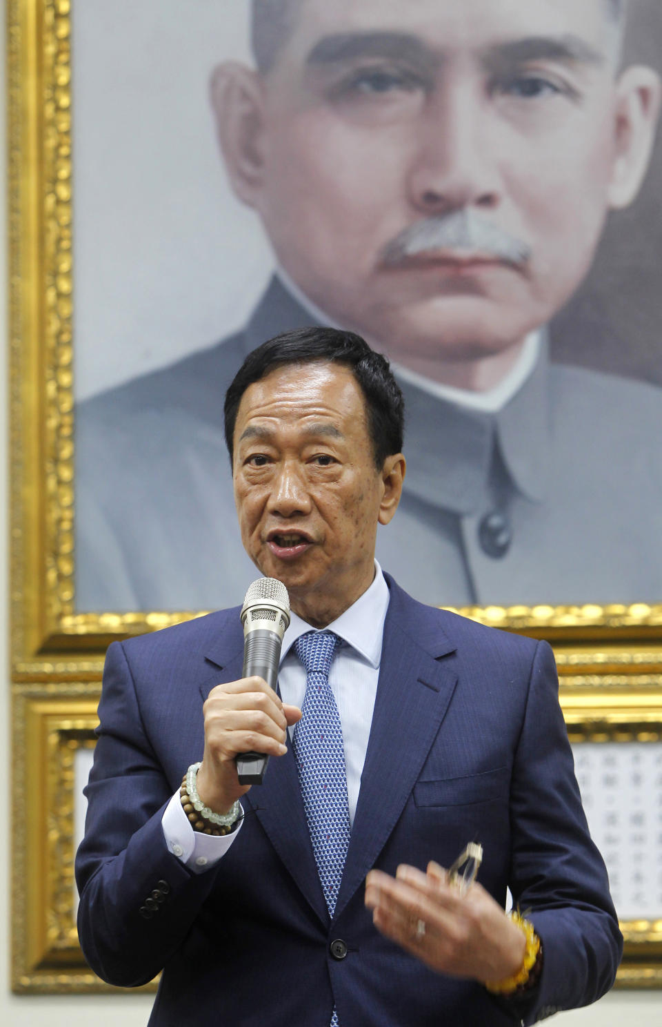 Terry Gou, the head of the world's largest electronics supplier, Foxconn, answers to media after meeting Nationalist Party''s chairman Wu Den-yih at the Nationalist Party''s headquarters in Taipei, Taiwan, Monday, May 13, 2019. Gou plans to run for president of Taiwan, bringing his pro-business and pro-China policies to what is expected to be a crowded field for next year's election. (AP Photo/Chiang Ying-ying)