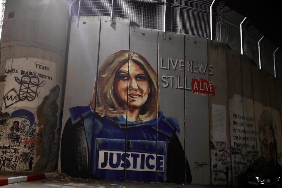 Posters of Al Jazeera journalist Shireen Abu Akleh ,who was killed by Israeli Forces, is seen during the preparations for U.S. President Joe Biden's visit in Bethlehem, West Bank on July 14, 2022