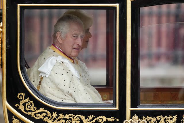 <p>Christopher Furlong/Getty Images</p> King Charles and Queen Camilla on their May 6 coronation day.