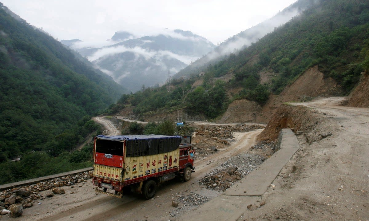 File. A truck drives along an Indian highway close to the Chinese border in the northeastern state of Arunachal Pradesh (Reuters)