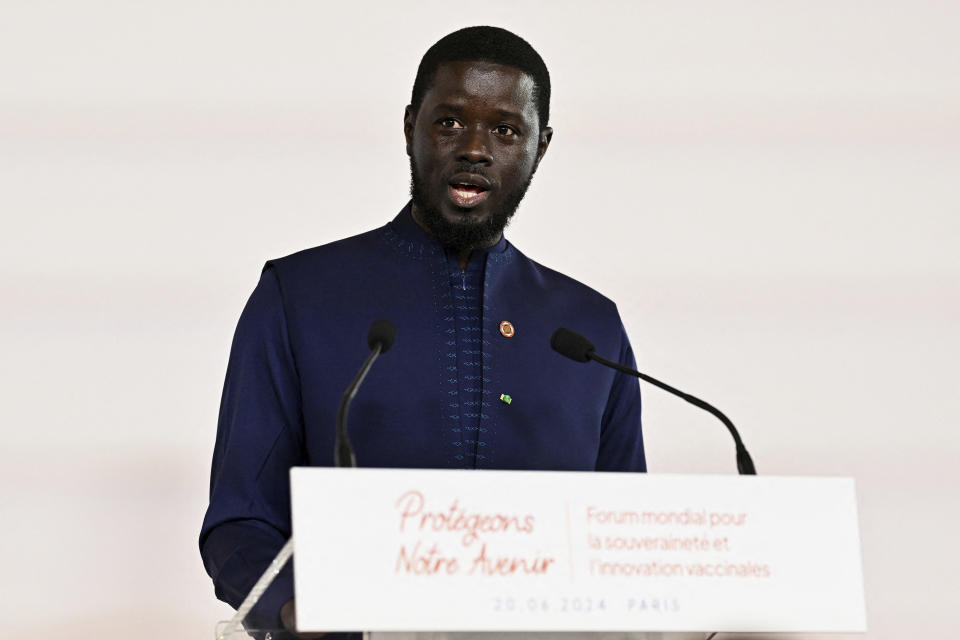 Senegal's President Bassirou Diomaye Faye delivers his speech during the African Vaccine Manufacturing Accelerator conference, Thursday, June 20, 2024 in Paris. French President Emmanuel Macron is joining some African leaders to kick off a planned $1 billion project to accelerate the rollout of vaccines in Africa, after the coronavirus pandemic bared gaping inequalities in access to them. (Dylan Martinez/Pool via AP)