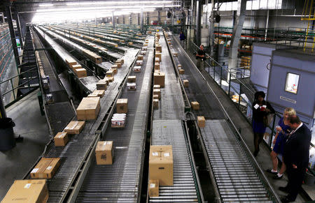 FILE PHOTO: Conveyors are seen at a Walmart Stores Inc distribution centers in Bentonville, Arkansas June 6, 2013. REUTERS/Rick Wilking/File Photo