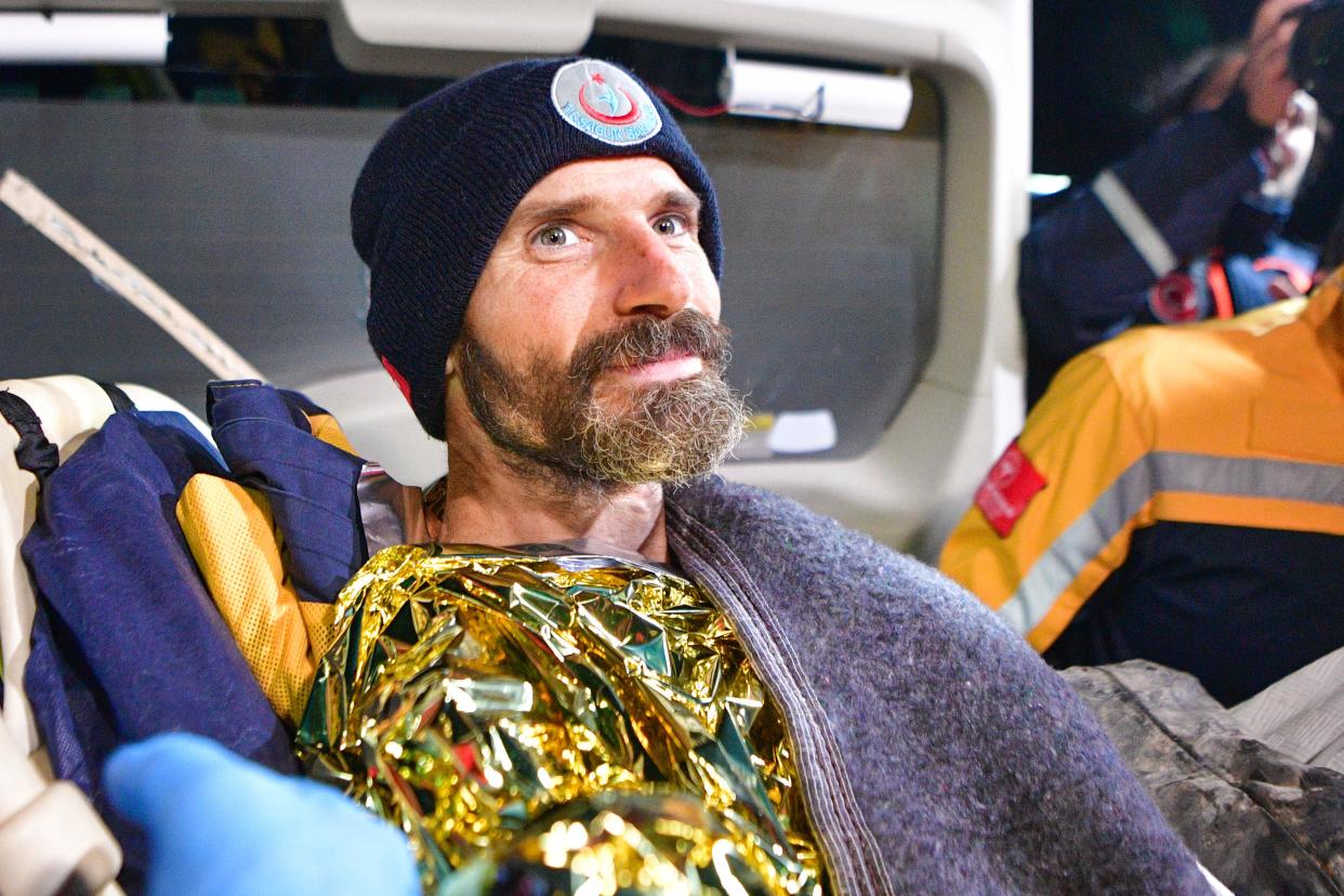 American researcher Mark Dickey is carried in a stretcher after being pulled out of Morca cave near Anamur, south Turkey (AP)