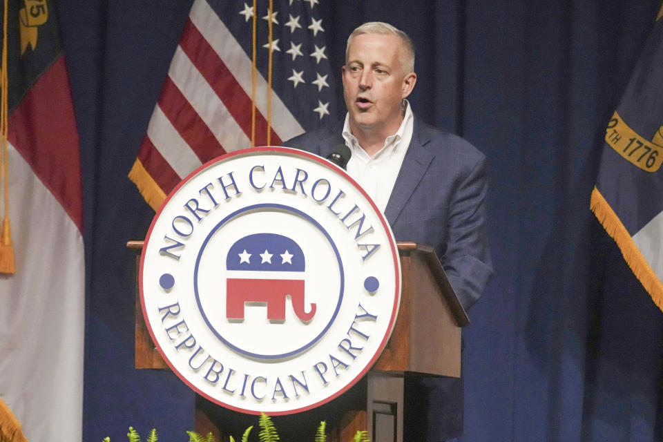 FILE - North Carolina GOP Chairman Michael Whatley speaks at the state party's convention on June 9, 2023, in Greensboro, N.C. Republican presidential candidate former President Donald Trump is calling for a leadership change at the Republican National Committee in an attempt to install a new slate of loyalists at the top of the GOP's political machine even before he formally secures the party's next presidential nomination. Trump is calling for Ronna McDaniel to be replaced by Whatley. (AP Photo/Meg Kinnard, File)