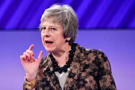 Britain's Prime Minister Theresa May replies to questions after speaking at the Confederation of British Industry's (CBI) annual conference in London, Britain, November 19, 2018. REUTERS/Toby Melville