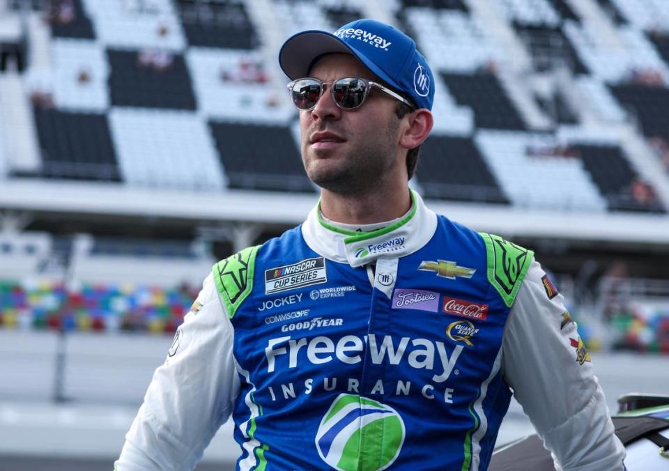 Aug 25, 2023; Daytona Beach, Florida, USA; NASCAR Cup Series driver Daniel Suarez (99) on pit road prior to qualifying for the Coke Zero Sugar 400 at Daytona International Speedway.