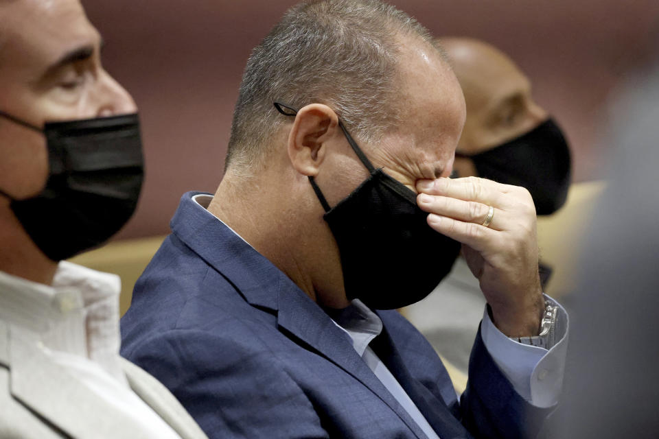 Fred Guttenberg, the father of slain student Jaime Guttenberg, wipes his eyes as Marjory Stoneman Douglas High School shooter Nikolas Cruz pleads guilty to all 17 counts of premeditated murder and 17 counts of attempted murder in the 2018 shootings, Wednesday, Oct. 20, 2021, at the Broward County Courthouse in Fort Lauderdale, Fla. Guttenberg is joining the top ranks of a progressive anti-gun group to promote like-minded political candidates around the country ahead of next year’s midterm elections. He will be a senior adviser to Brady PAC. (Amy Beth Bennett/South Florida Sun Sentinel via AP, Pool)