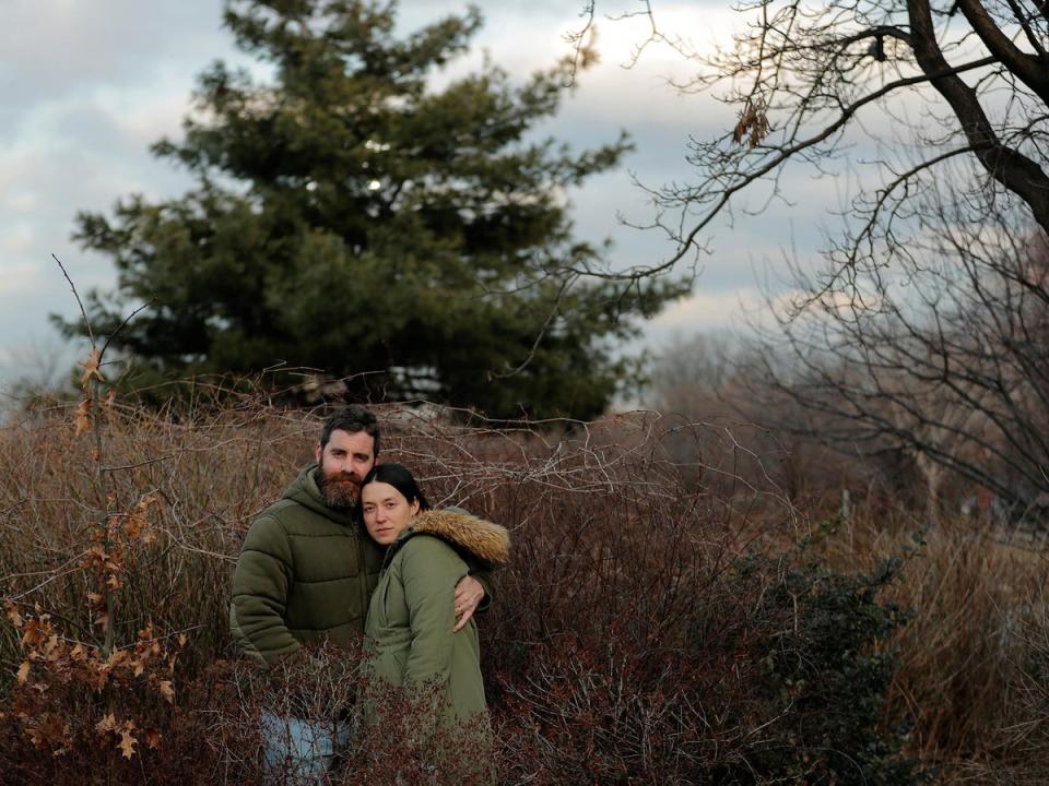 Jenny Ostrom, 37, a director of photography and her husband Chad Ostrom, 37, a director, stand in McCarren Park, near their home in the Brooklyn borough of New York, U.S., February 8, 2018. 