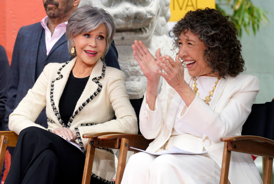 The aerobics pioneer introduced Tomlin as she was honored with a Hand and Footprint ceremony outside the TCL Chinese Theater in Los Angeles. "I can't stop crying! I'm very moved to be here [and] it's a real honor. Lily's been pushing me around for decades," Fonda jokingly began her speech. "So, I'm really glad they're gonna put her hands in cement; maybe they'll get stuck; and her feet too."