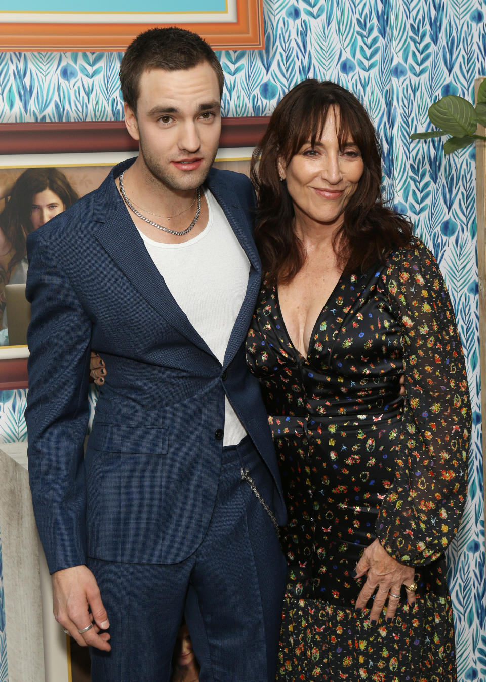 Jackson and Katey standing together, with Katey's arm around Jackson's waist