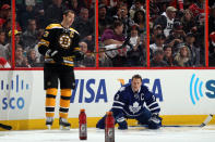 OTTAWA, ON - JANUARY 28: Zdeno Chara #33 of the Boston Bruins and Team Chara stands as Dion Phaneuf #3 of the Toronto Maple Leafs and team Chara kneels on the ice during the 2012 Molson Canadian NHL All-Star Skills Competition at Scotiabank Place on January 28, 2012 in Ottawa, Ontario, Canada. (Photo by Bruce Bennett/Getty Images)