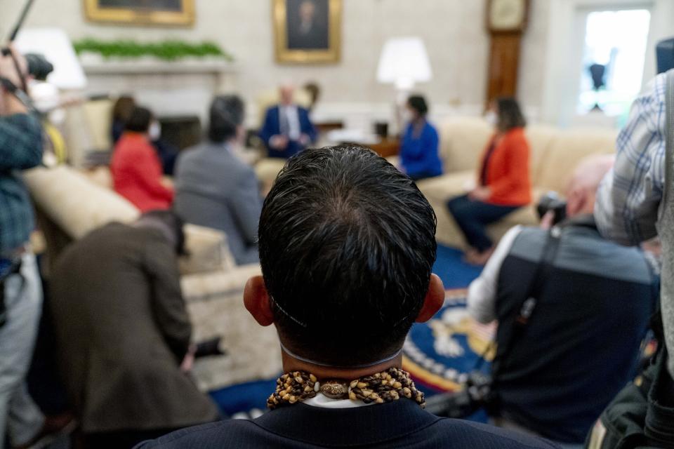 Rep. Kaiali'i Kahele, D-Hawaii, attends a meeting with President Joe Biden and other members of the Congressional Asian Pacific American Caucus Executive Committee in the Oval Office at the White House in Washington, Thursday, April 15, 2021. (AP Photo/Andrew Harnik)