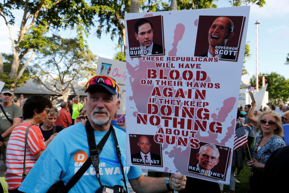 <p>Protester James Lee of Port St. Lucie, Florida, takes part in a Call To Action Against Gun Violence rally by the Interfaith Justice League and others in Delray Beach, Fla., Feb. 19, 2018. (Photo: Joe Skipper/Reuters) </p>