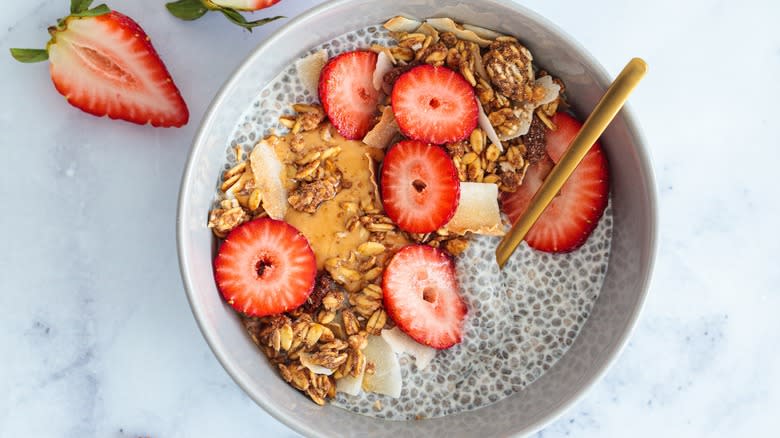 Chia pudding with granola and strawberries
