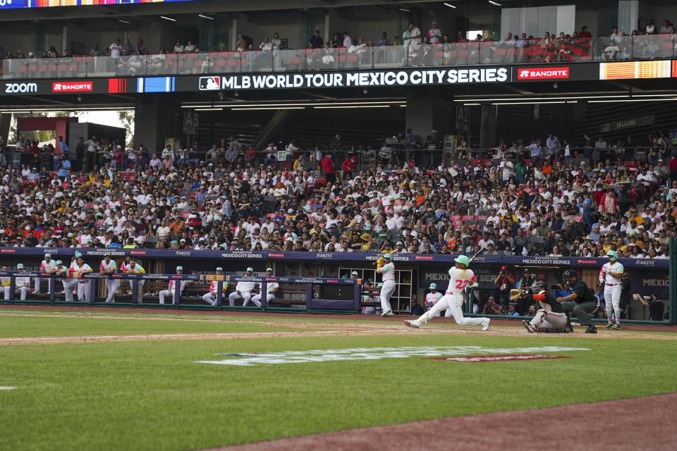 San Diego Padres' Juan Soto follows through on a solo home run against San Francisco Giants during the fourth inning of a baseball game at Alfredo Harp Helu Stadium in Mexico City, Saturday, April 29, 2023. (AP Photo/Fernando Llano)