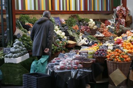 A shopper browses at a vegetable market, in London, Britain February 3, 2017. REUTERS/Peter Nicholls