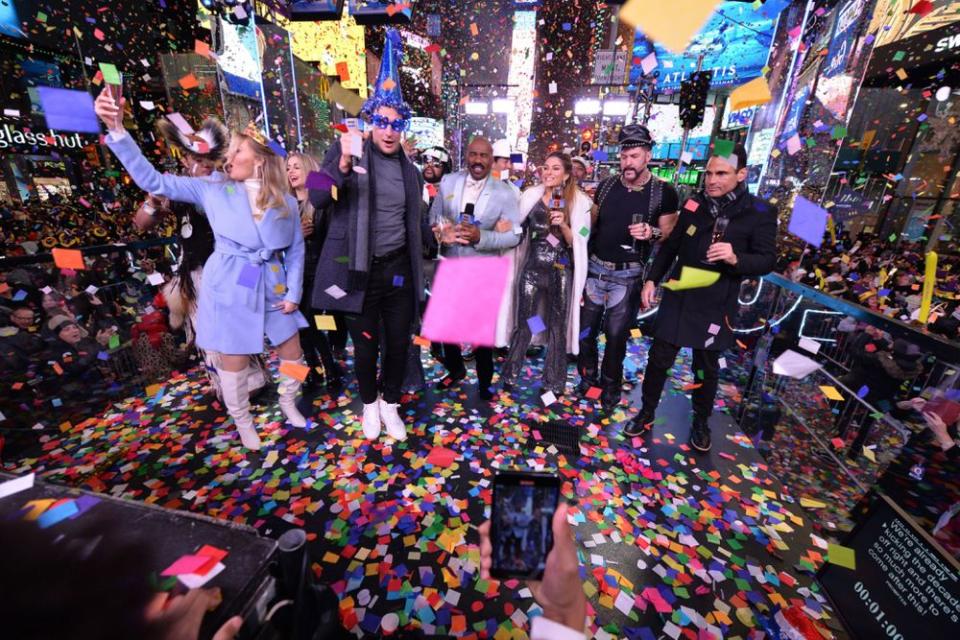 Steve Harvey (center) hosts Fox's New Year's Eve countdown | Anthony Behar/FOX/PictureGroup/Shutterstock