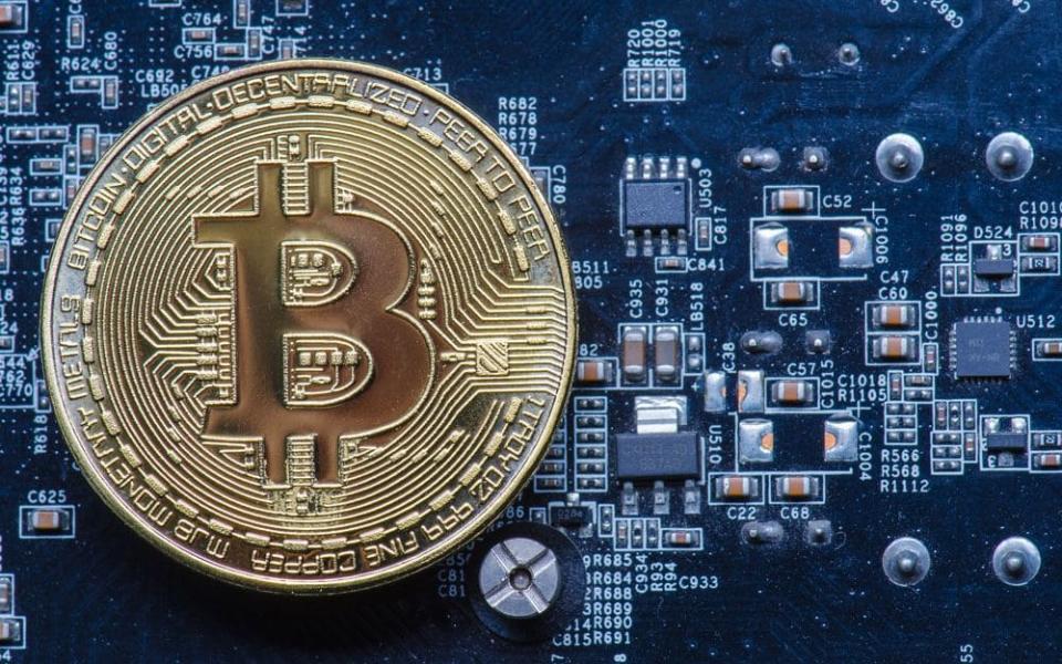 Bitcoin is still in demand despite it more than halving in price in recent months - Getty