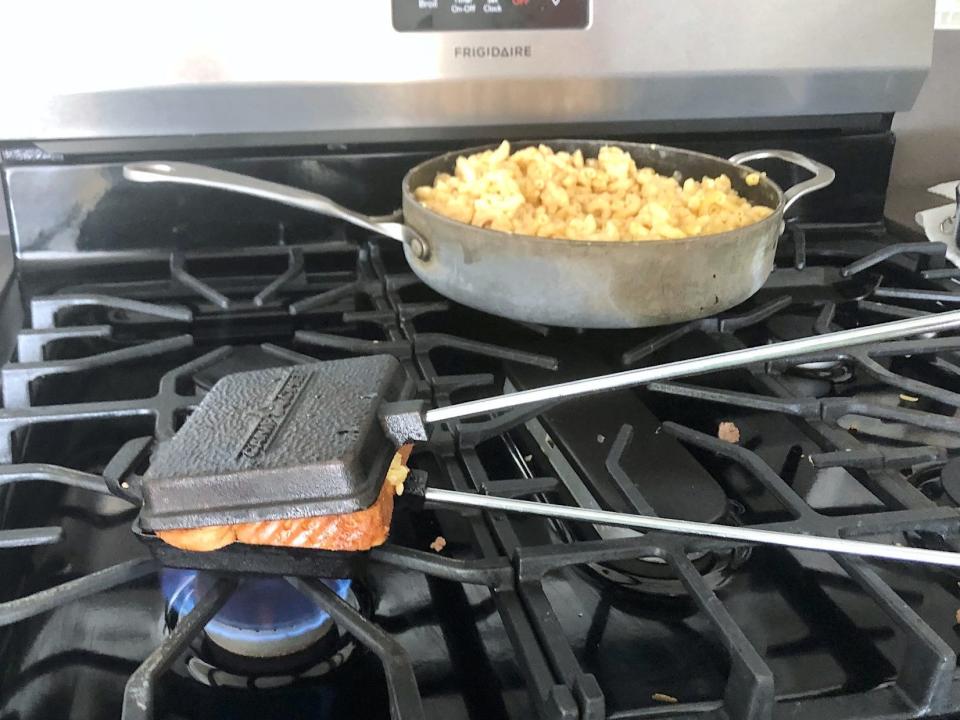 Camping press on the stove for Guy Fieri's grilled cheesse