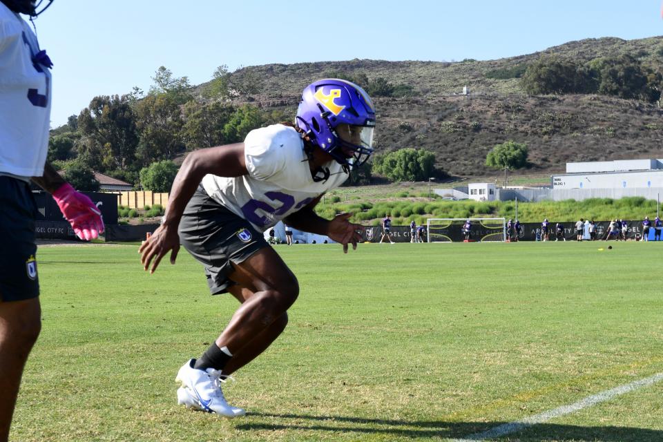 Defensive back John Moore, a Royal High graduate, participates in a drill during a Cal Lutheran University football practice on Thursday, Sept. 15, 2023.