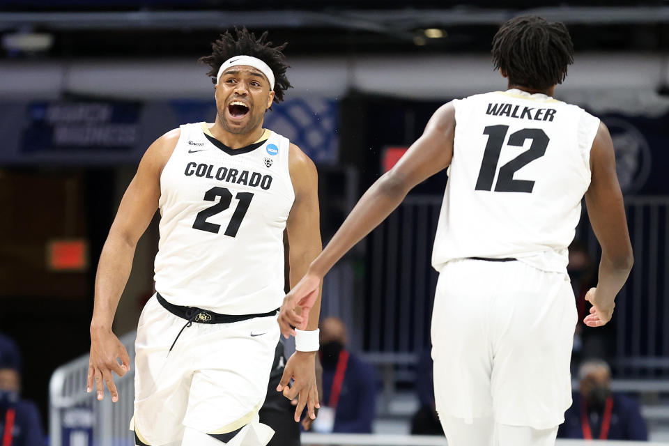 INDIANAPOLIS, INDIANA - MARCH 20: Evan Battey #21 of the Colorado Buffaloes reacts to a play against the Georgetown Hoyas in the first round game of the 2021 NCAA Men's Basketball Tournament at Hinkle Fieldhouse on March 20, 2021 in Indianapolis, Indiana. (Photo by Andy Lyons/Getty Images)