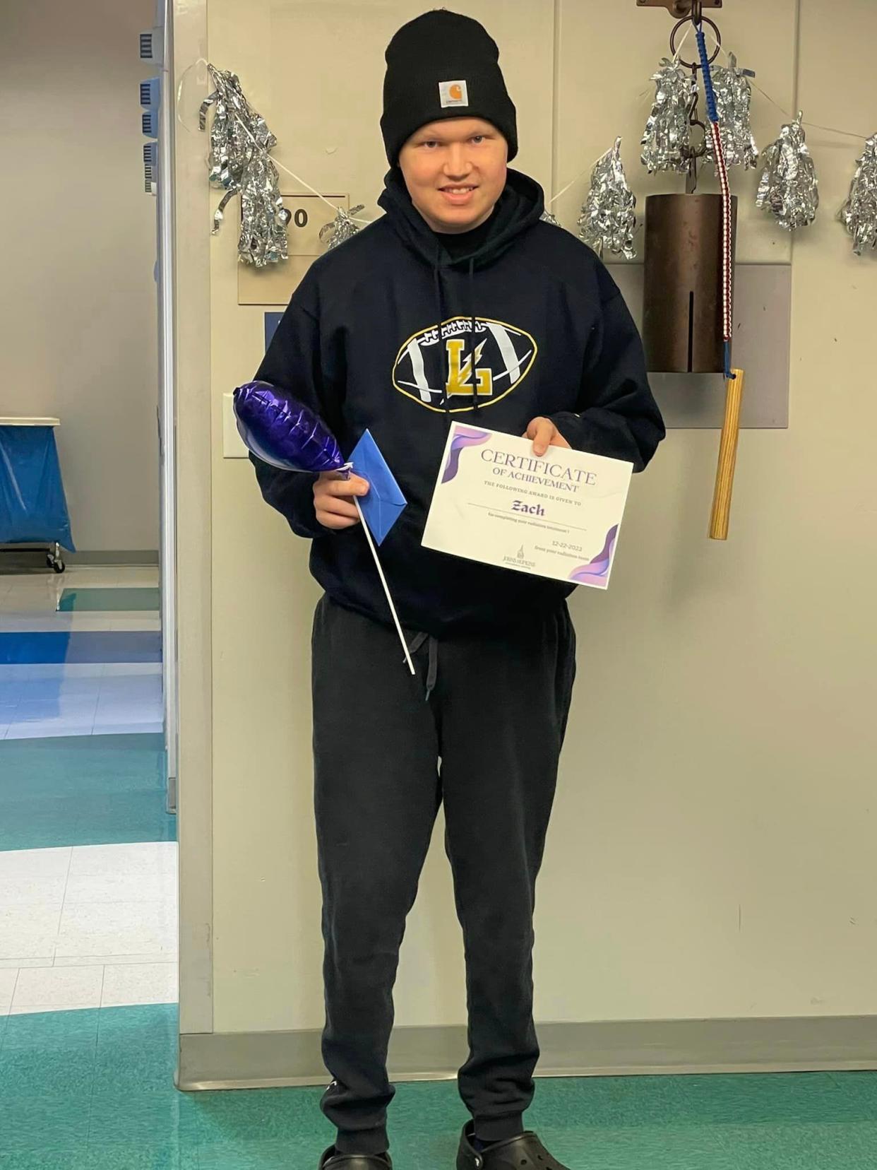 Zachary Gorsuch rang the bell at Johns Hopkins after completing radiation treatment in December 2023.