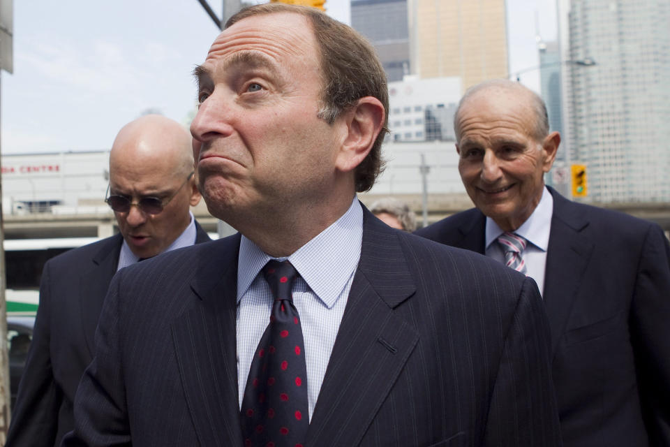 FILE - In this Aug. 15, 2012, file photo, National Hockey League commissioner Gary Bettman arrives for collective bargaining talks in Toronto. The National Hockey League Players' Association announces its decision whether to terminate the current collective bargaining agreement and set the clock ticking toward another potential work stoppage in 2020. (AP Photo/The Canadian Press, Chris Young, File)